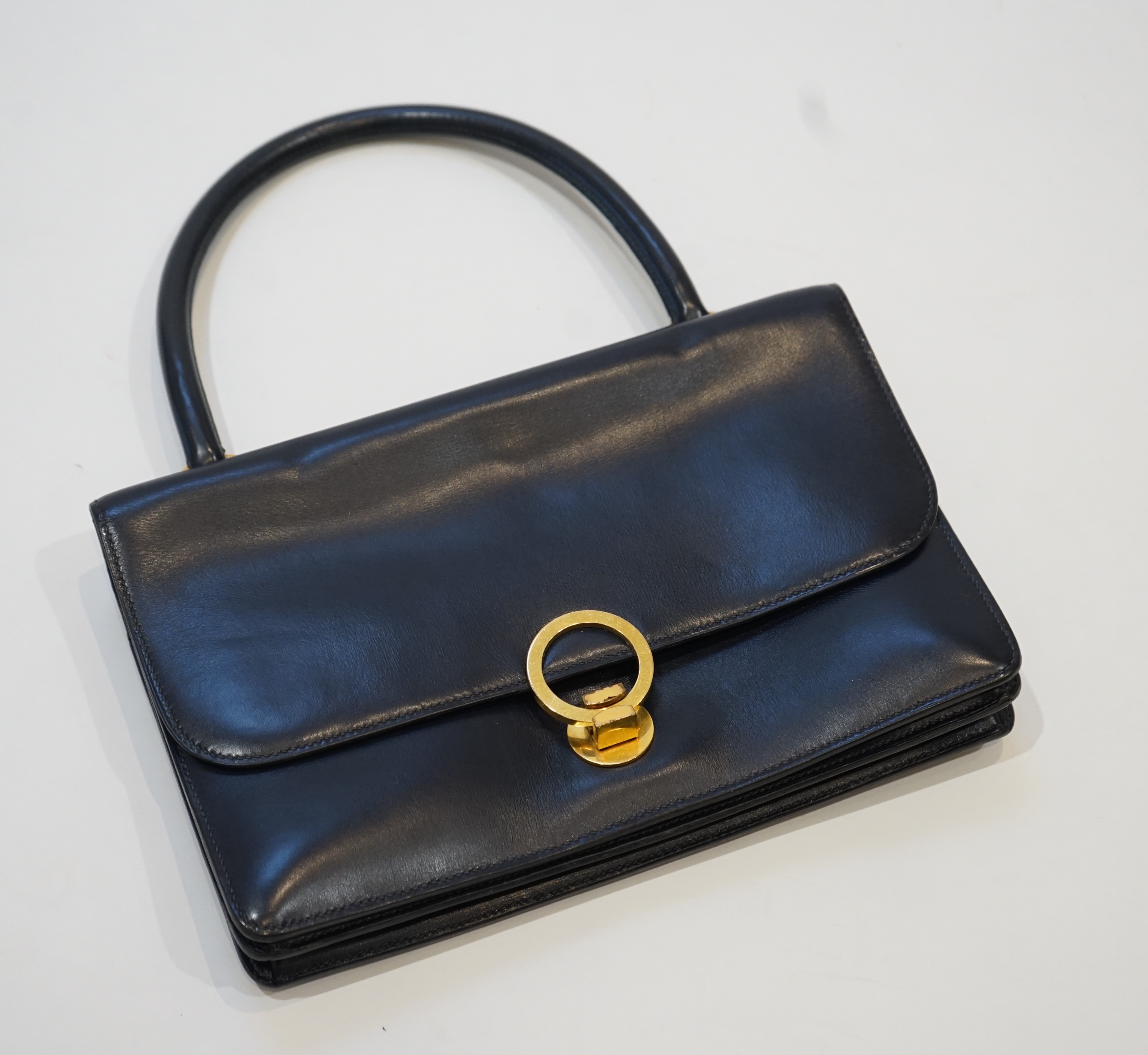 A vintage Hermes Ring handbag in bleu marine Veau Box leather, circa 1960-1969 27cm.